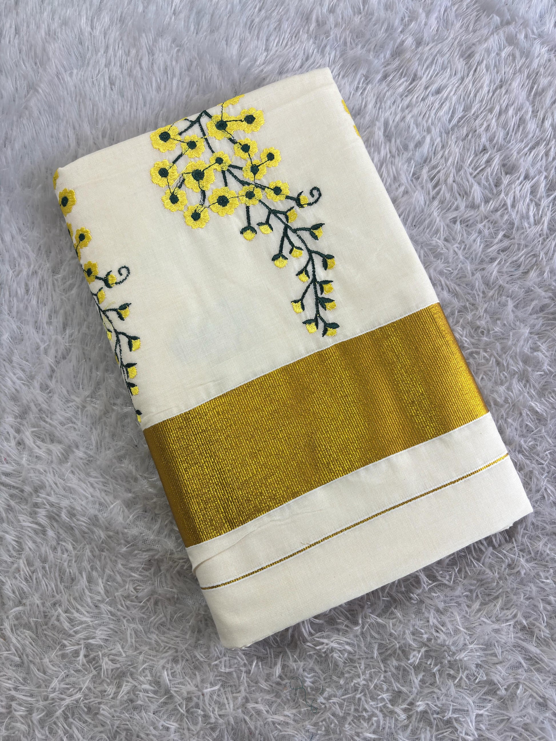 Kanikonna embro saree