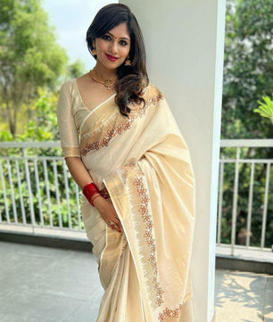 Flower shed golden tissue emroidered saree