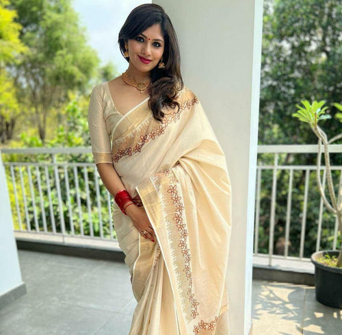 Flower shed golden tissue emroidered saree