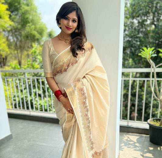Flower shed golden tissue emroidered saree