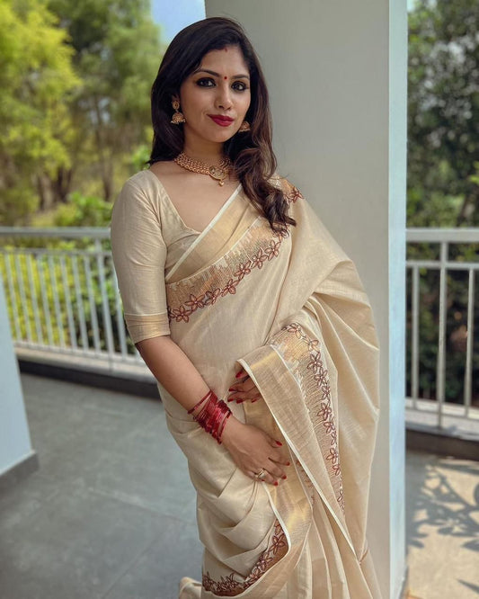 Flower shed golden tissue emroidered saree
