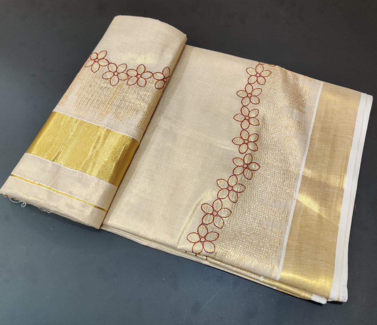 Flower shed golden tissue emroidered saree