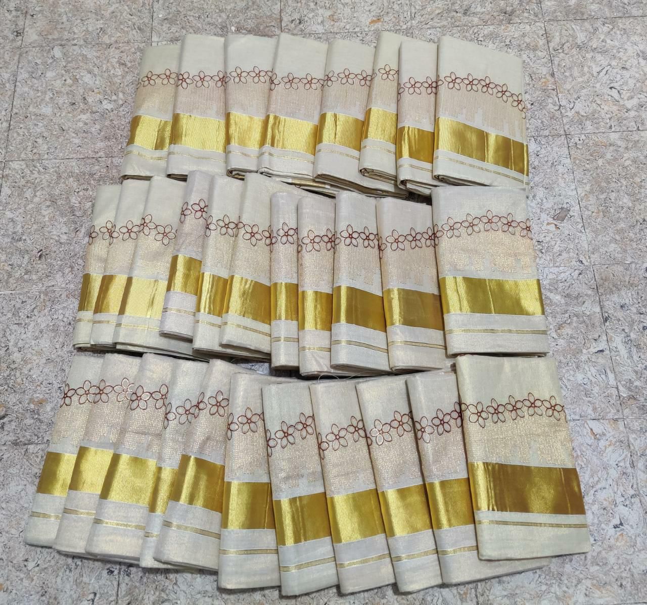 Flower shed golden tissue emroidered saree