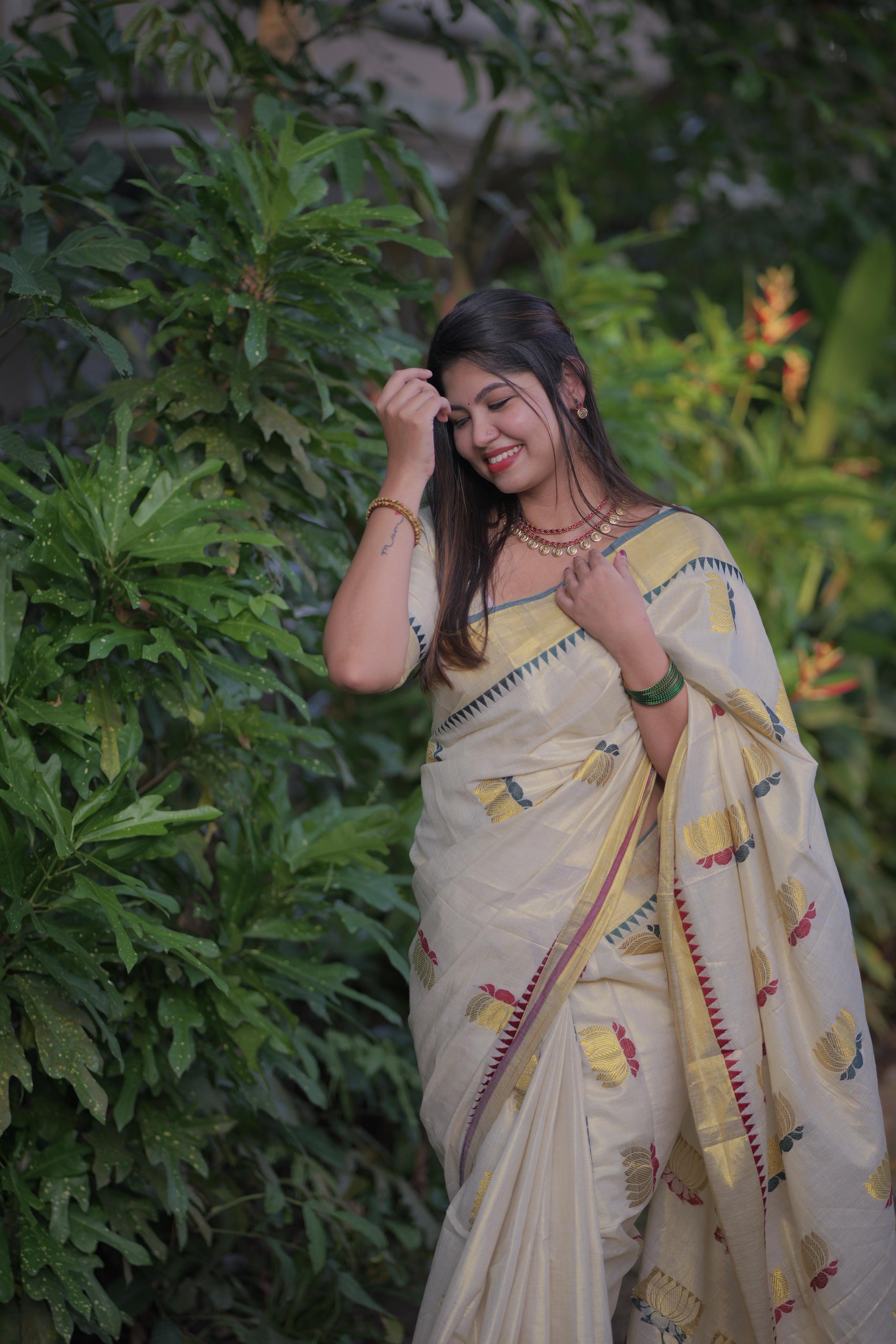 Lotus weave golden tissue saree