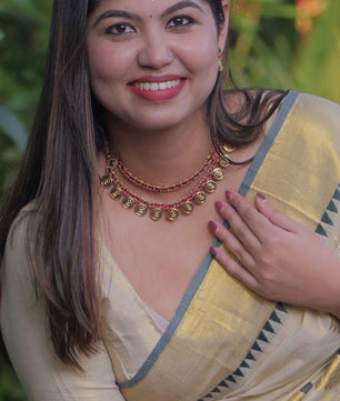 Lotus weave golden tissue saree