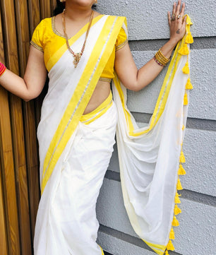 Yellow silver mul mul saree