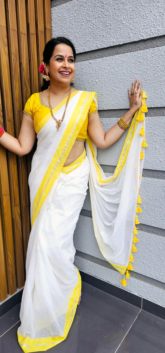 Yellow silver mul mul saree
