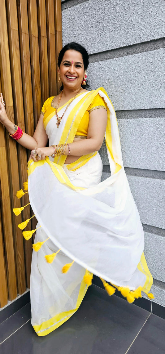 Yellow silver mul mul saree