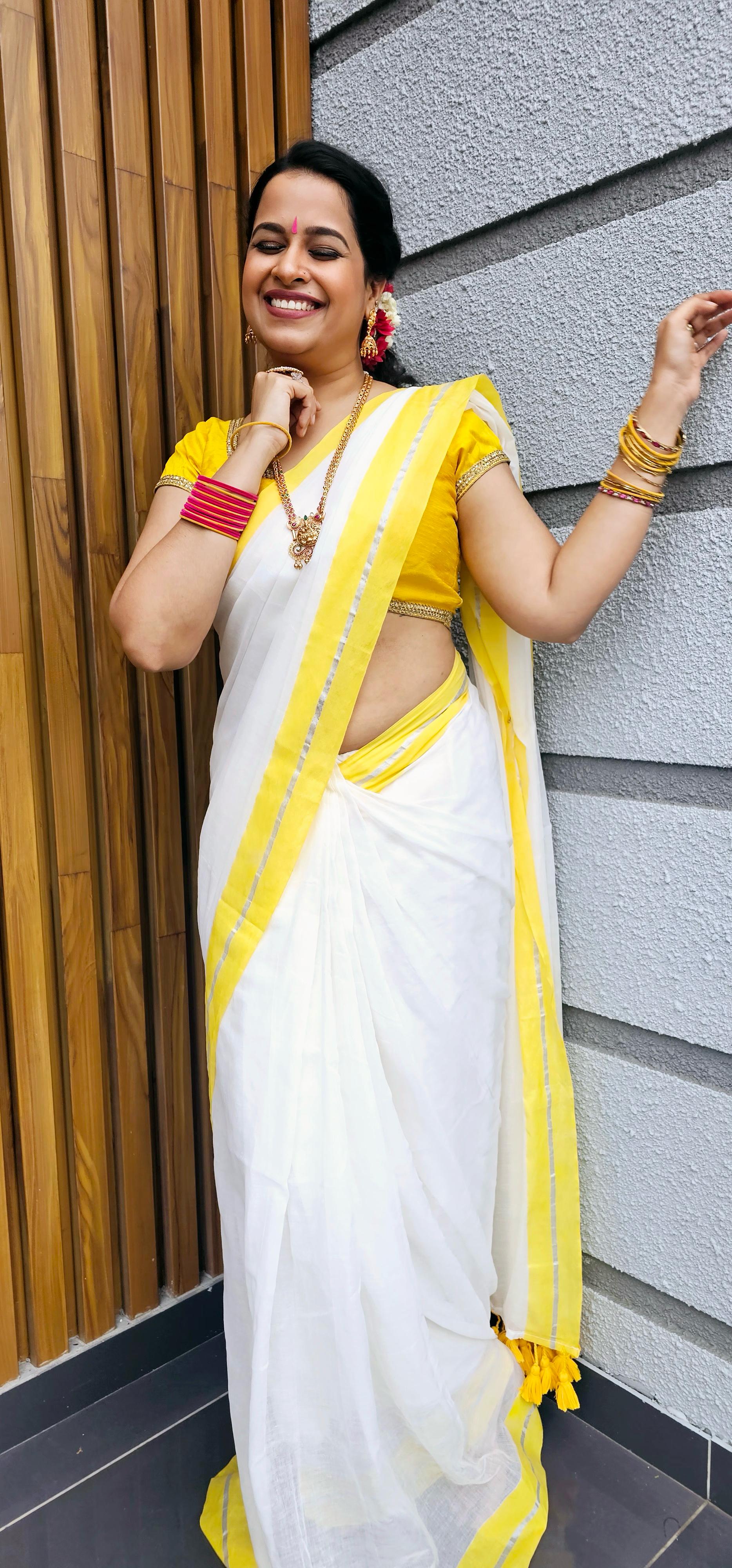 Yellow silver mul mul saree
