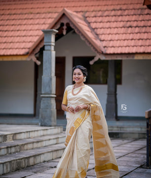 Border temple weave golden tissue saree