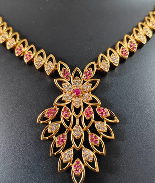 Beautifull  Rice patern neklace with AD stone floral pendent
